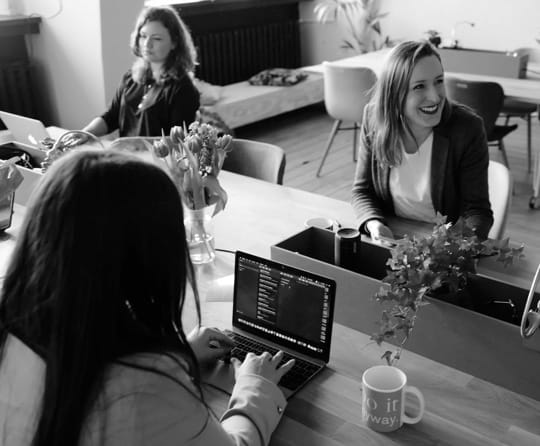 business women with notebooks